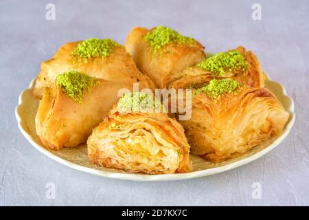 Sweets arabic dessert baklava, , kunafa, kadayif with pistachio and cheese Stock Photo
