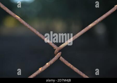 Close up rusted wire netting. Metal wires covered for garden fences. Bursa Mudanya, Turkey. Stock Photo