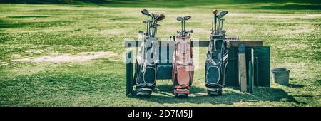 Golf bags banner with clubs on golfing course green grass background Stock Photo