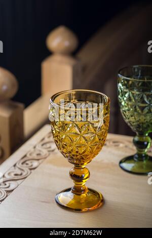 Two colored glass with faceted patterns for wine. Close-up Stock Photo