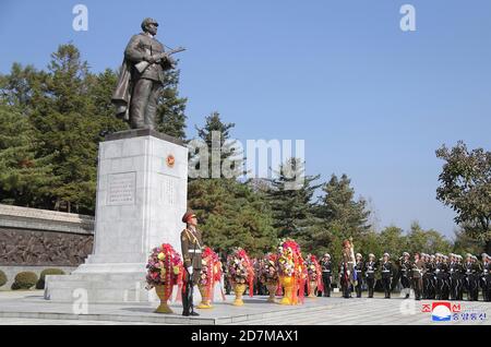 (201024) -- BEIJING, Oct. 24, 2020 (Xinhua) -- Photo provided by the Korean Central News Agency (KCNA) shows a ceremony to present flower baskets at the cemetery for Chinese People's Volunteers (CPV) martyrs in Hoechang County, the Democratic People's Republic of Korea (DPRK), on Oct. 21, 2020. Kim Jong Un, chairman of the Workers' Party of Korea and chairman of the State Affairs Commission of the DPRK, on Wednesday laid a flower basket at the cemetery for CPV martyrs in Hoechang. Various activities have been held in the DPRK to mark the 70th anniversary of the CPV entering the DPRK to fight i Stock Photo