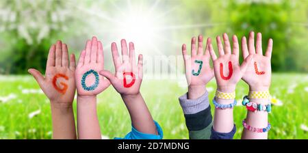 Children Hands Building Word God Jul Means Merry Christmas, Grass Meadow Stock Photo