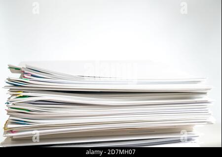 A pile of documents with copy space on white background. Stock Photo