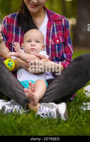 Young Mother With Cute Baby Boy Huging And Posing Over White Background  Stock Photo, Picture and Royalty Free Image. Image 51351061.