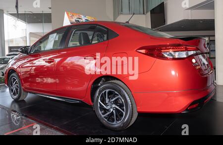 Phayao, Thailand - Sep 13, 2020: Tail Left Red Toyota Yaris Ativ 2020 in Toyota Car Dealership Showroom Stock Photo