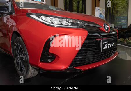 Phayao, Thailand - Sep 13, 2020: Zoom Front Right Red Toyota Yaris Ativ 2020 in Toyota Car Dealership Showroom Stock Photo