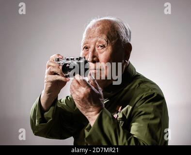 (201024) -- BEIJING, Oct. 24, 2020 (Xinhua) -- Photo taken on Oct. 13, 2020 shows Qian Sijie, veteran of the Chinese People's Volunteers (CPV), in Beijing, capital of China. Qian was born in 1928. He entered the Democratic People's Republic of Korea (DPRK) as a war correspondent in the War to Resist U.S. Aggression and Aid Korea with the CPV army in 1951.  On Oct. 19, 1950, as requested by the DPRK, CPV forces crossed the Yalu River to aid the DPRK's fight there until a truce was signed in 1953. A total of 2.9 million CPV soldiers entered the battlefield.   Photographers from Xinhua took portr Stock Photo