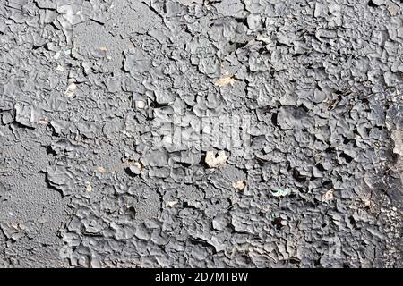 Texture of old white peeling paint on a concrete surface. Abstract background for design. Stock Photo