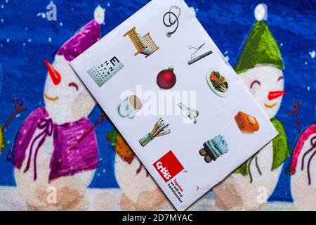 Post on Christmas mat - charity appeal, Crisis together we will end homelessness Stock Photo