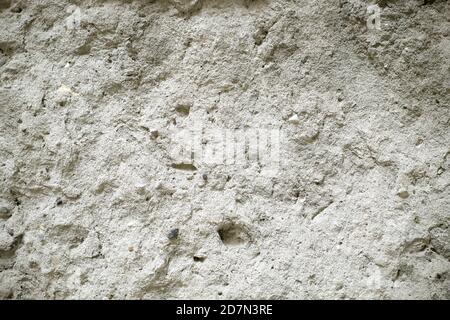 Grey ruined waall texture. Concrete background. Stock Photo