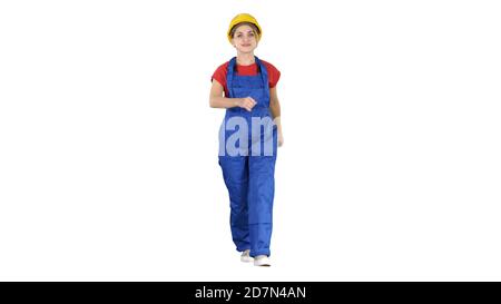 Confident experienced forewoman walking with will to work on whi Stock Photo
