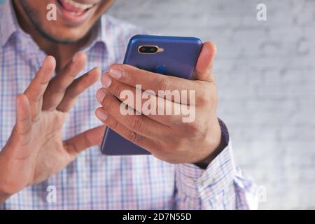 Businessman In a video conference discussing on smart phone  Stock Photo