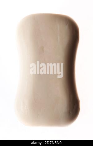 A bar of natural white soap isolated on white background. Studio shot. Hygiene theme - bacteria and virus prevention Stock Photo