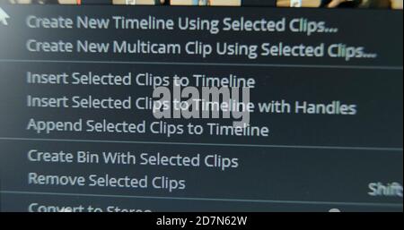 Movie maker creates new timeline using selected footages in contemporary computer program macro view Stock Photo
