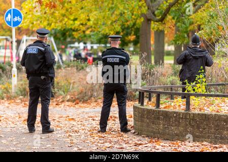 Central Park, Chelmsford, Essex, UK. 24th Oct, 2020. A protest against the COVID-19 Coronavirus lockdown measures was announced to take place in the Essex county town of Chelmsford, a town which is included in the rise to tier 2 'high' alert level which has brought in greater restrictions. In preparation a large police presence was maintained in the park but was not required, as only a small contingent arrived. The park is displaying its Autumn colours