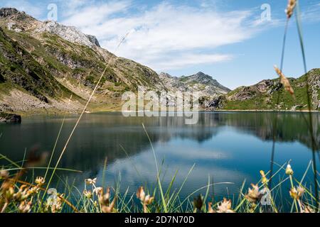 Beautiful lake surrounded by mountains in Somiedo National Park, Asturias Stock Photo