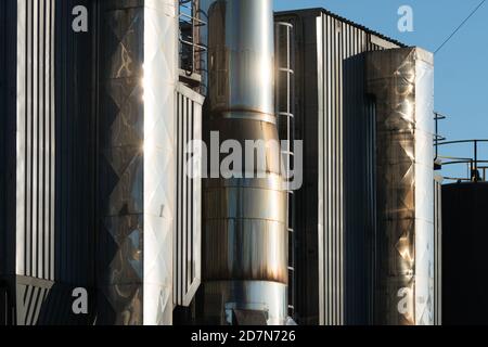 steel grain bins or containers and storage facility at a brewery factory Stock Photo