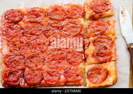 Plum tarte tatin, rectangle shape with cinnamon Stock Photo