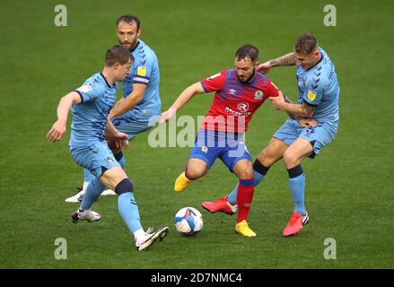 Blackburn Rovers' Adam Armstrong (centre) battles for the ball with Coventry City's Liam Kelly and Kyle McFadzean during the Sky Bet Championship match at St Andrews, Birmingham. Stock Photo