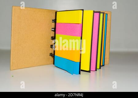 spiral notebook of sticky notes on isolate white background. Stock Photo