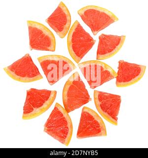 grapefruit cut in to slices close up top view isolated on white background. Stock Photo
