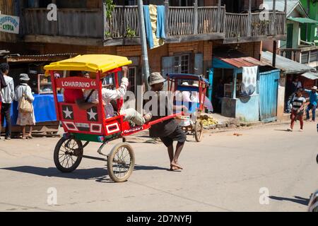 Editorial. A Rickshaw taxis in the streets of Madagascar Stock Photo