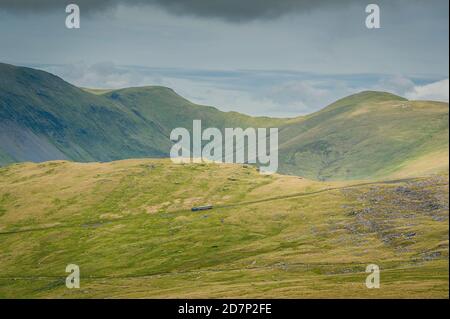 View from Ranger Path at Llanberis Path with a mountain train route to the Yr Wyddfa peak - foreland of Snowdon. Highest mountain range in Wales. Stock Photo