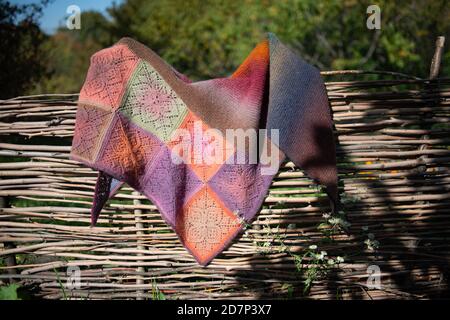 Handmade. Crochet. Woolen thread. Colorful shawl Stock Photo