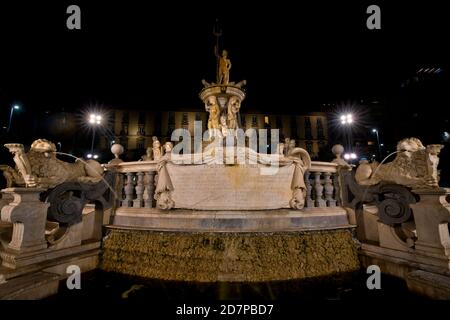 Fountain of Neptune (Fontana del Nettuno) is a monumental fountain, located in Municipio square, Naples, Italy Stock Photo