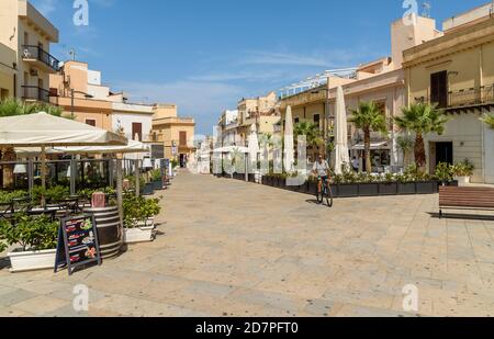 Terrasini, Sicily, Italy - September 24, 2020: View of Duomo Square with outdoor bars and restaurants in the center of Terrasini, province of Palermo, Stock Photo