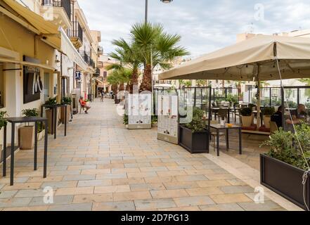 Terrasini, Sicily, Italy - September 24, 2020: View of Duomo Square with outdoor bars and restaurants in the center of Terrasini, province of Palermo, Stock Photo