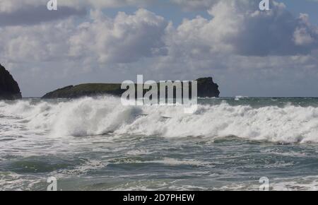 Mullion Island from Polurrian beach, Polurrian Cove on the Lizard Peninsula, Cornwall. Stock Photo