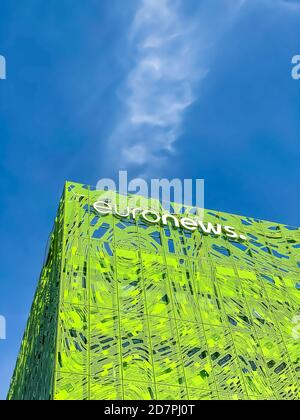 Euronews, european pay television news network brand logo on its headquarter office building located in eco-district Confluence. Mobile photography. L Stock Photo