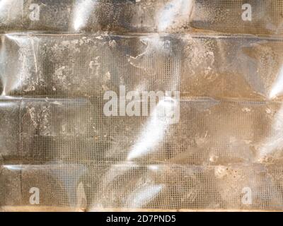 The texture of the transparent surface of the plastic container. Stock Photo