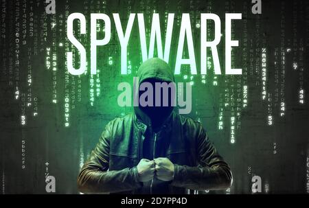 Faceless hacker with SPYWARE inscription, hacking concept Stock Photo