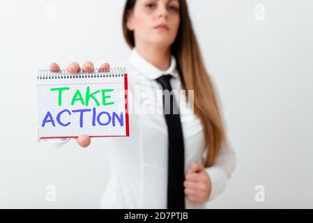 Text sign showing Take Action. Business photo text advices someone to do something or reaction right now Model displaying different empty color notepa Stock Photo