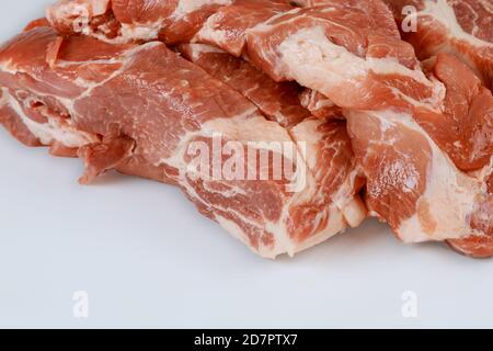 Pieces raw pork tenderloin isolated on white background. Stock Photo