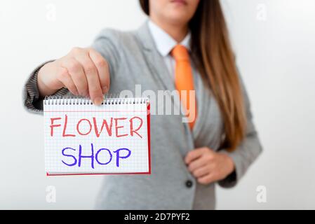 Handwriting text writing Flower Shop. Conceptual photo where cut flowers are sold with decorations for gifts Model displaying different empty color no Stock Photo