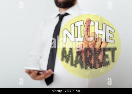 Handwriting text Niche Market. Conceptual photo Subset of the market on which specific product is focused Model with pointing hand finger symbolizing Stock Photo