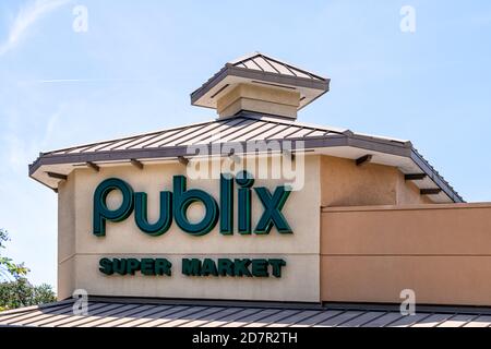 Tampa, USA - April 27, 2018: Downtown city in Florida and closeup of sign for Publix grocery store super market on building exterior Stock Photo