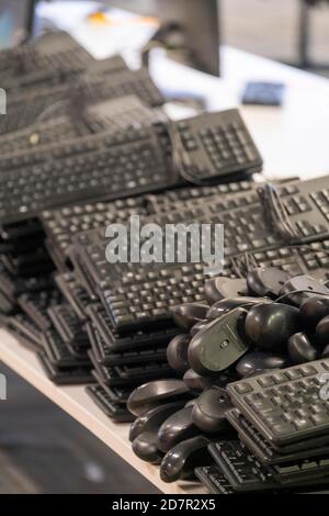 Used keyboards and computer mice Stock Photo