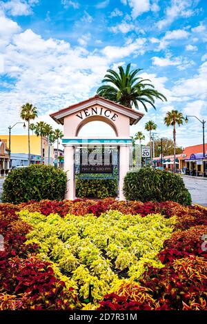 Venice, USA - April 29, 2018: Welcome sign and decorations in small Florida city town village little Italy with colorful architecture on gulf coast an Stock Photo