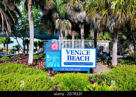 Venice, USA - April 29, 2018: Small Florida beach city town with colorful architecture in gulf of Mexico with blue sign Stock Photo