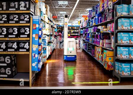 Sterling, USA - September 12, 2020: Walmart supermarket superstore shop interior inside with products goods aisle and robot checking inventory Stock Photo