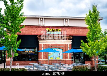 Sterling, USA - September 12, 2020: Outside empty seating area of Potbelly fast food restaurant with sign and text and nobody during covid Stock Photo