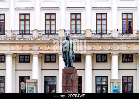 Warsaw, Poland - December 25, 2019: Grand National Opera or Teatr Narodowy in Warszawa downtown with statue sculpture of Wojciech Boguslawski Stock Photo