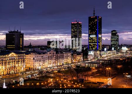 Warsaw, Poland - January 22, 2020: High angle aerial panoramic view of Warszawa cityscape skyline with centralna train station and skyscrapers buildin Stock Photo