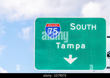 Tampa, USA road street interstate highway green sign for i75 south to Tampa Florida with text isolated closeup and sky Stock Photo