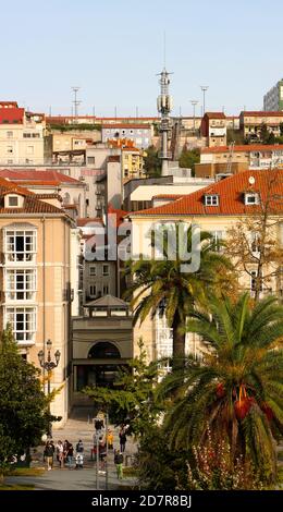 View of the Pereda Gardens Santander Cantabria Spain from high up on the Botin arts centre on a sunny Autumn morning Mobile phone mast palm trees Stock Photo