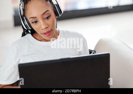 Woman working on laptop Stock Photo